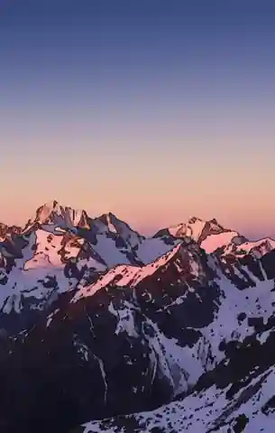 A painted alpine range at first light